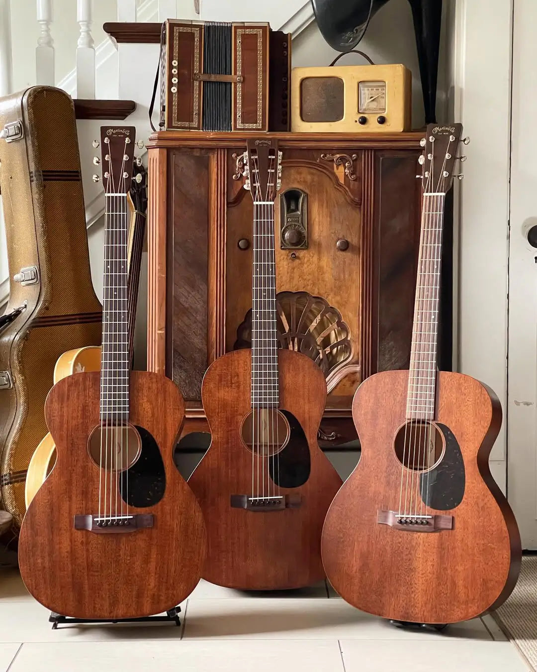 The_Martin_15_series_offers_an_all_solid_wood_American_made_instrument_with_tasteful_vintage_appointments._From_left_to_right_are_the_00-15M_000-15SM_12-fret_and_000-15M._Contact_the.webp
