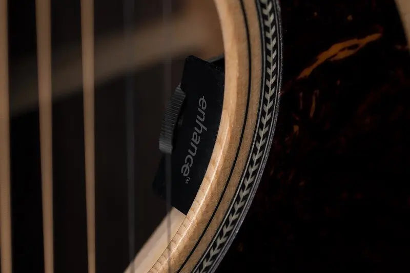 hello_my_name_is_GPC-16E_My_Grand_Performer_shape_with_cutaway_makes_me_a_modern_guitar_with_deep_roots._My_back_and_sides_made_of_solid_East_Indian_Rosewood_topped_off_by_white_bindi.webp