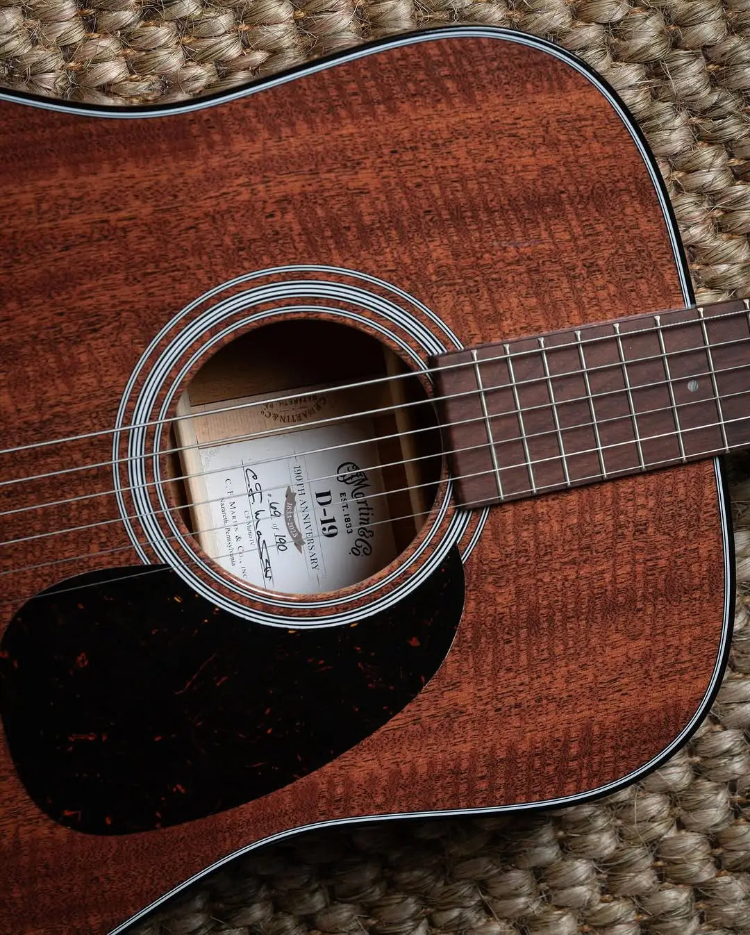 The_Martin_D-19_190th_Anniversary_guitar_stands_as_a_remarkable_testament_to_nearly_two_centuries_of_unparalleled_craftsmanship_and_musical_innovation._This_limited-edition_masterpiec_e43a1d7a-69ca-49aa-8b8d-942723297b1e.webp